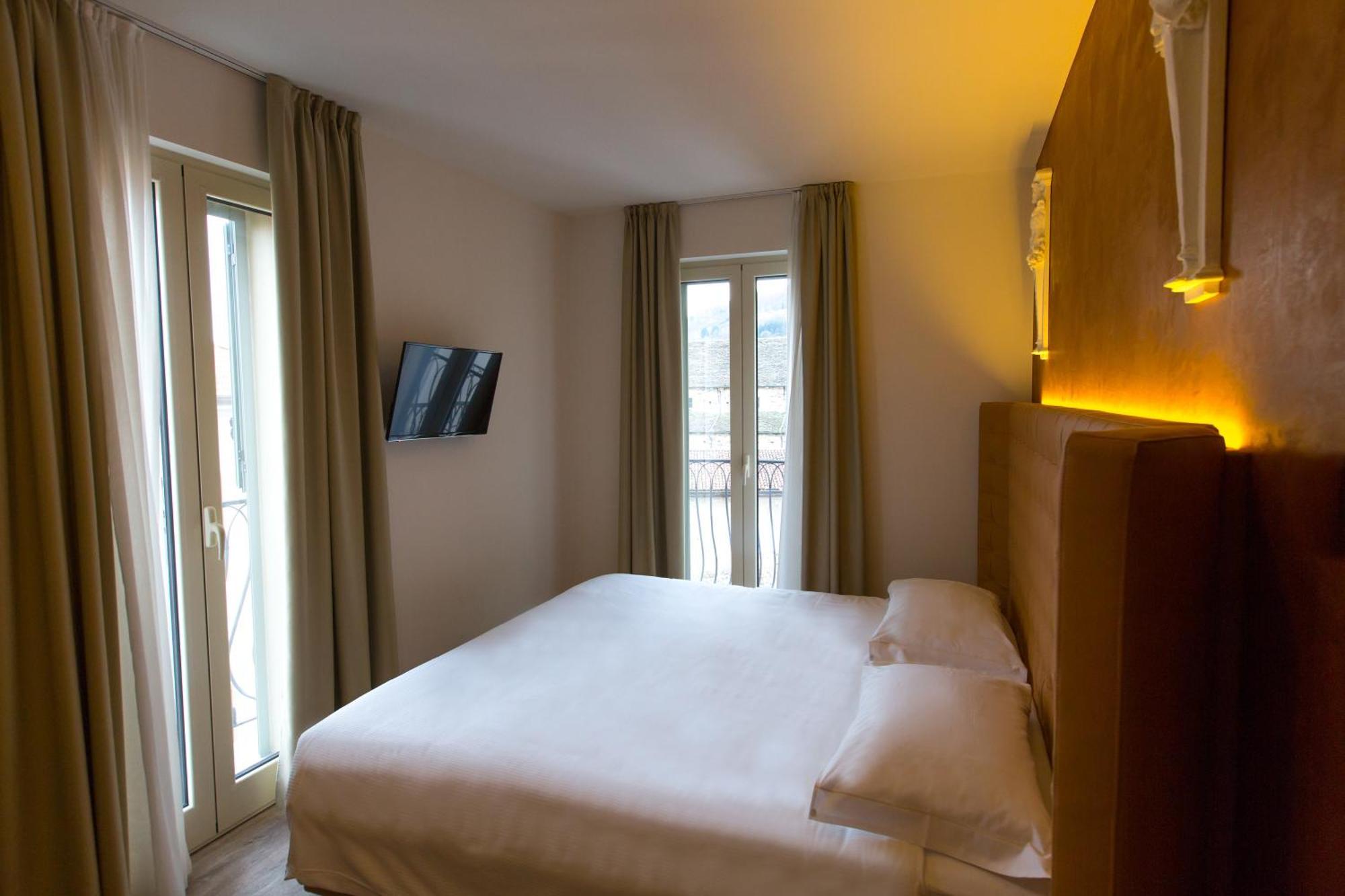 Hotel Al Campanile - Luxury Suites & Apartments Baveno Exterior foto